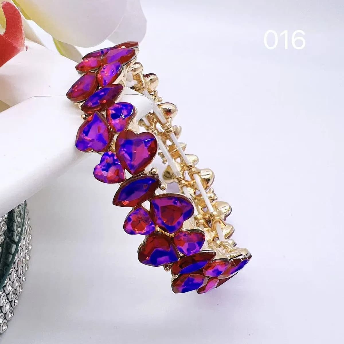 Bransoletka damska z czerwono-fioletowymi kryształami