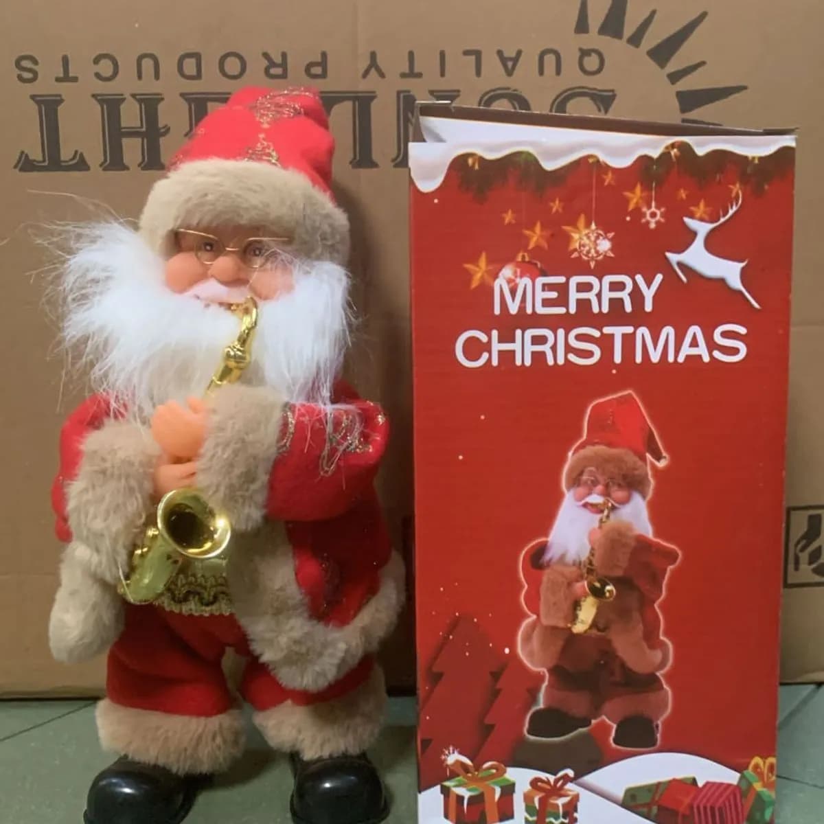 Dekoracja świąteczna figurka grającego Mikołaja z saksofonem