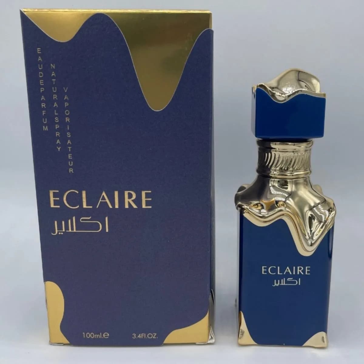 Perfumy Lattafa Eclaire 100ml EDP, granatowo-złoty flakon