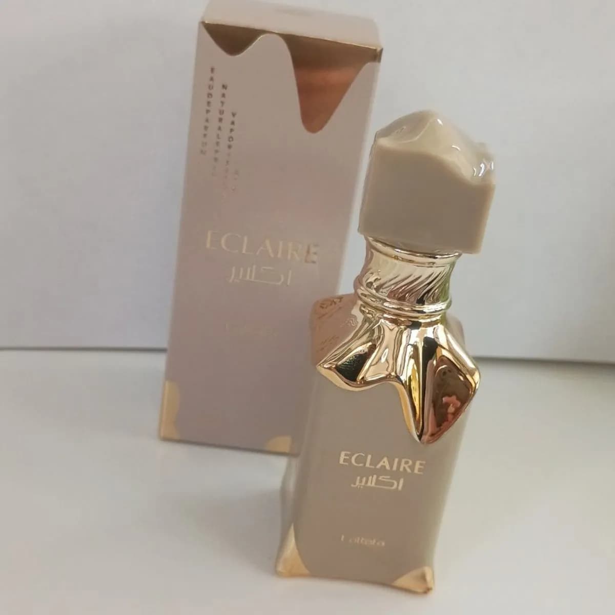 Perfumy Éclaire 30ml w butelce beżowo-złotej