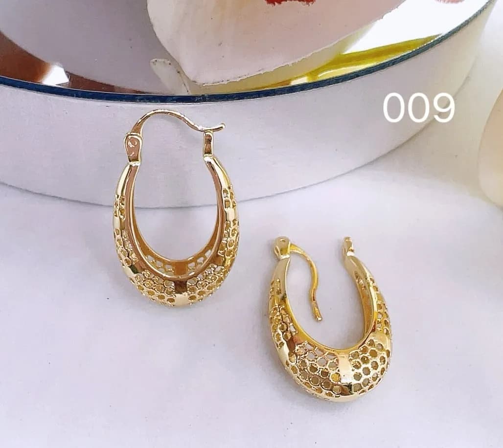 Kolczyki damskie złote ażurowe owalne 12 szt.