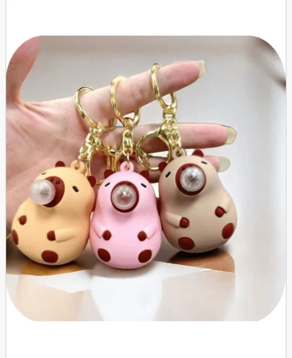 Brelok do kluczy zwierzątko z lampką LED, złote zapięcie