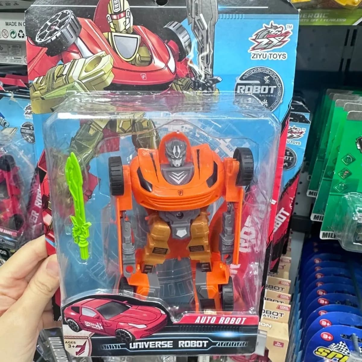 Robot transformujący się w samochód pomarańczowy ZIYU TOYS z mieczem