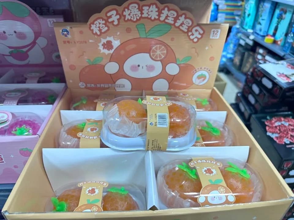 Zabawki Squeeze pomarańczowe kulki sensoryczne - gniotek pomarańcza