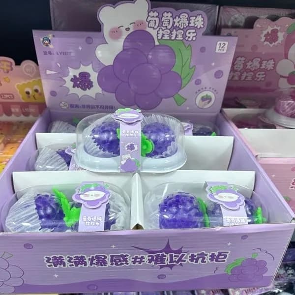 Zabawka antystresowa Squeeze winogrono PK13543 fioletowy gniotek 12szt