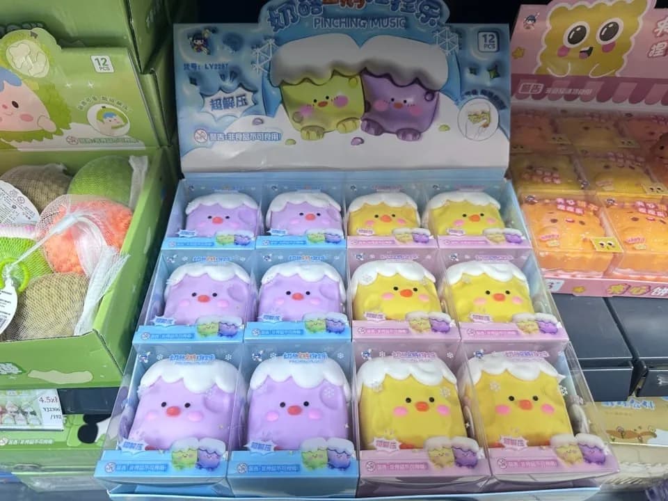 Zabawki antystresowe Squeeze fioletowe i żółte 12 szt. Pinching Music