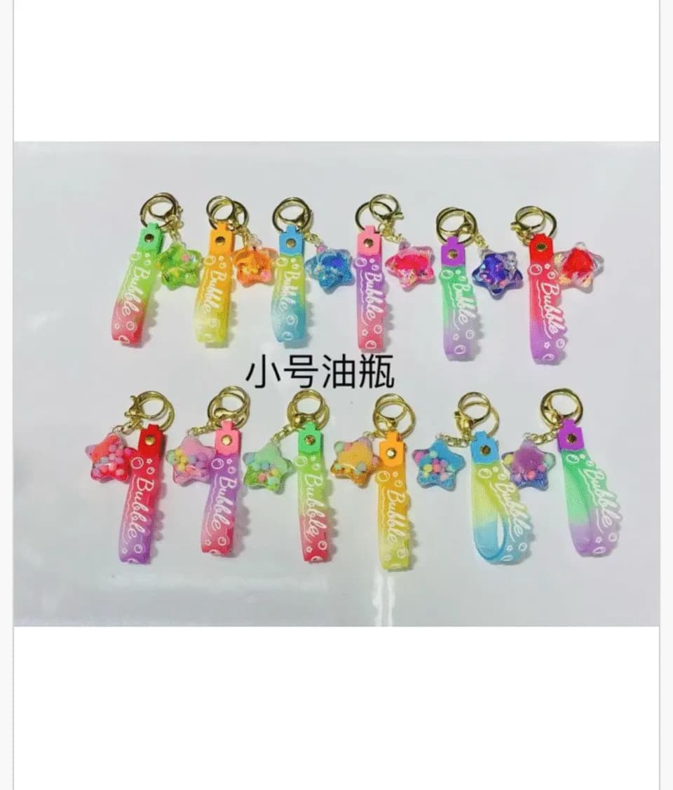 Brelok do Kluczy Gwiazdka z Płynem i Paskiem Bubble 24szt